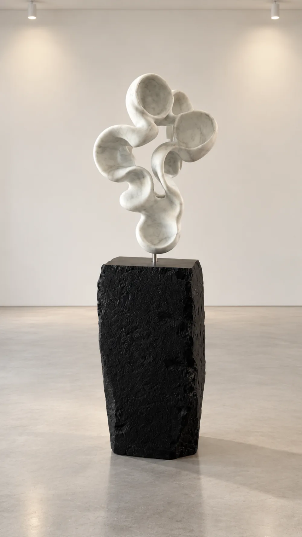 Cloud Atlas, an abstract sculpture by Yoko Kubrick, on a granite base, back view.