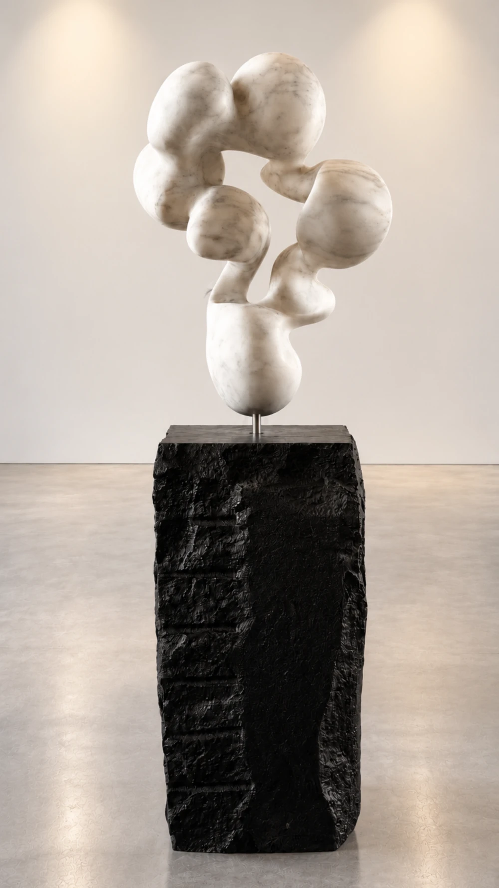 Cloud Atlas, an abstract sculpture by Yoko Kubrick, on a granite base.