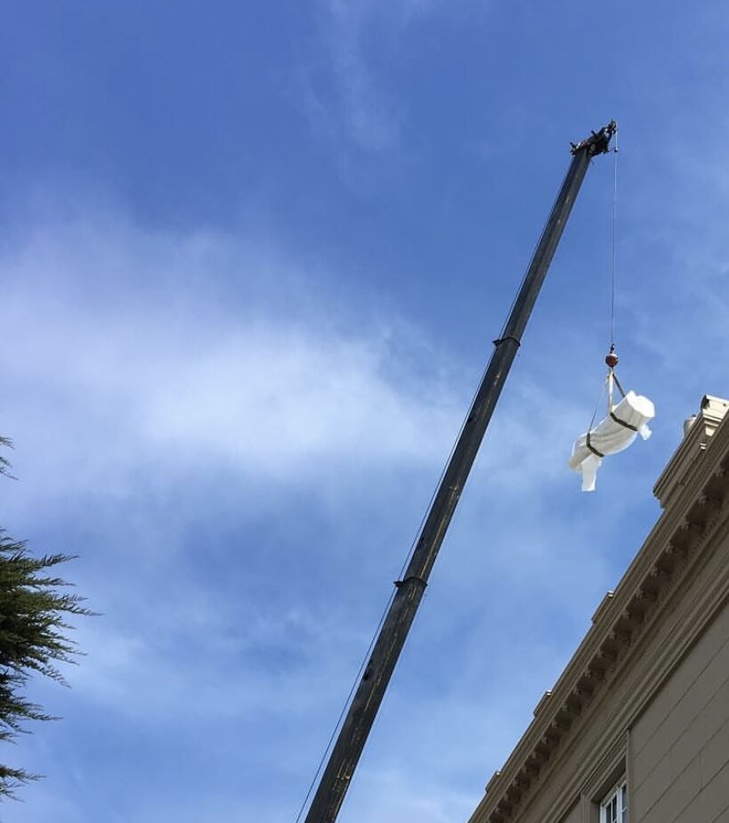 Lethe being positioned by crane during installation at Le Petit Trianon