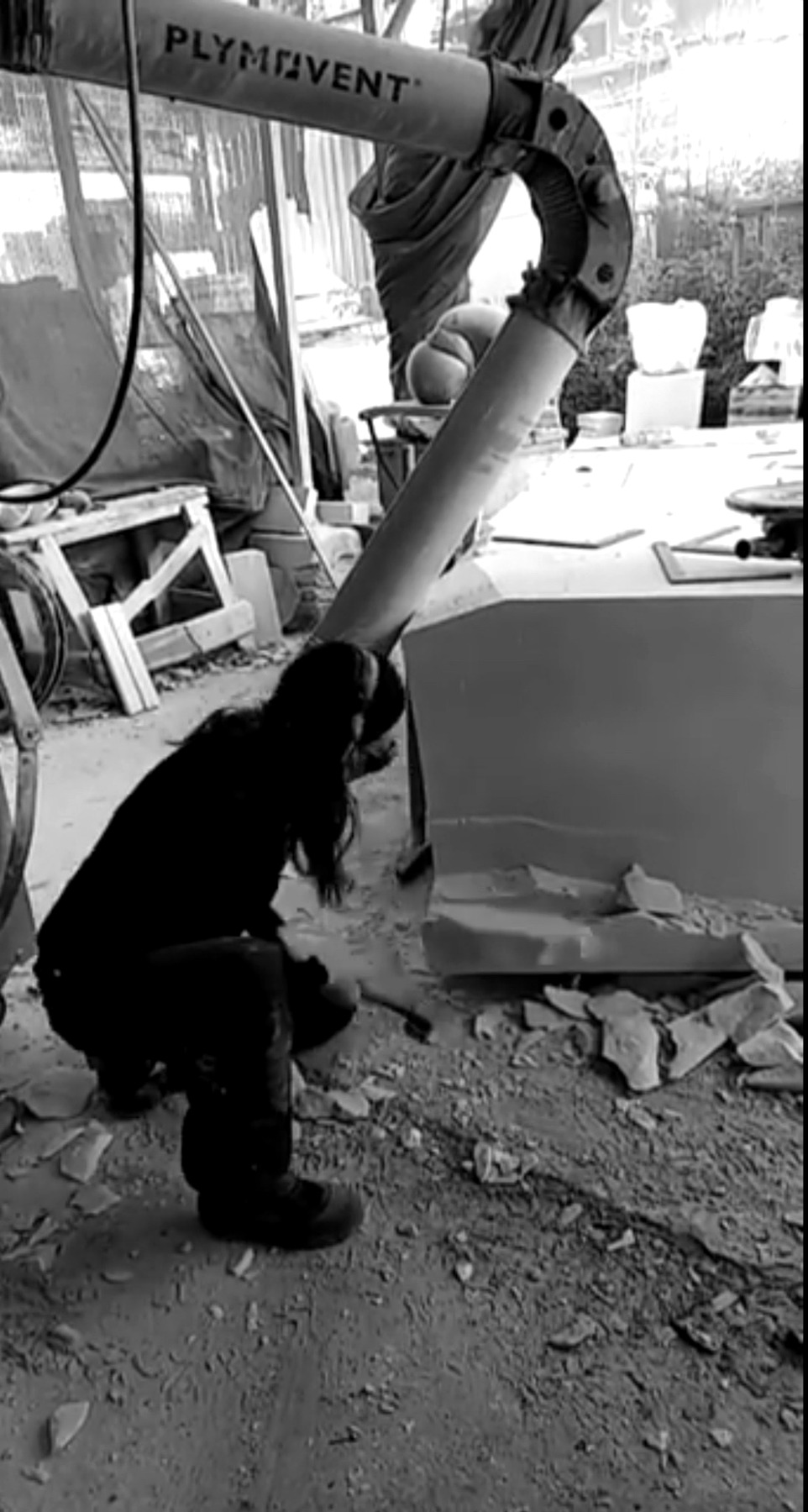 Yoko Kubrick carving marble in a working Pietrasanta atelier