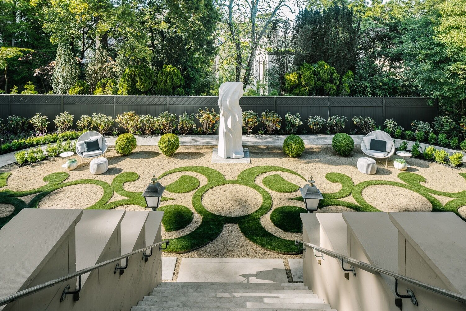 Site-specific marble sculpture by Yoko Kubrick set within the formal garden at Le Petit Trianon, San Francisco