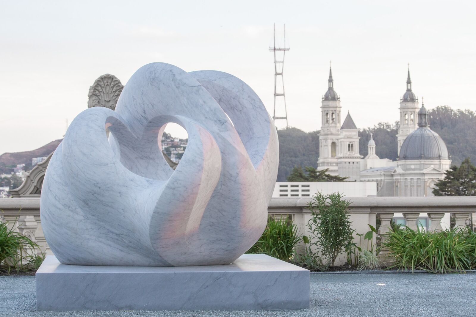 Tides, a carved marble sculpture by Yoko Kubrick, installed on the same terrace at the University of San Francisco